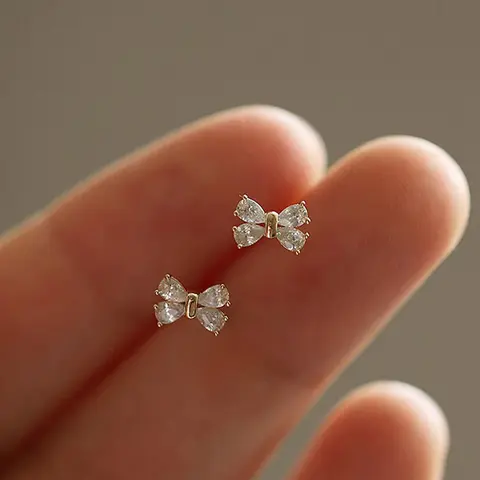1 Pair Dainty Mini Bowknot Cubic Zirconia Stud Earrings, Cz Earrings, Shining Earrings, Tiny Bow Shape Shiny Inlaid Stone Post Earrings, Sweet Minimalist Daily Casual Costume Piercing Ear Accessories For Women, Studs Earrings