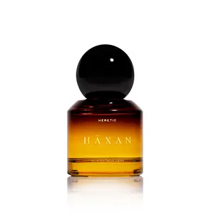HERETIC PARFUM HÄXAN EAU DE MACABRE White Musks, Turkish Rose, Fossilized Amber. A fragrance for the intuitive, the spell-weaver, the ones who commune with silence and shadow.
