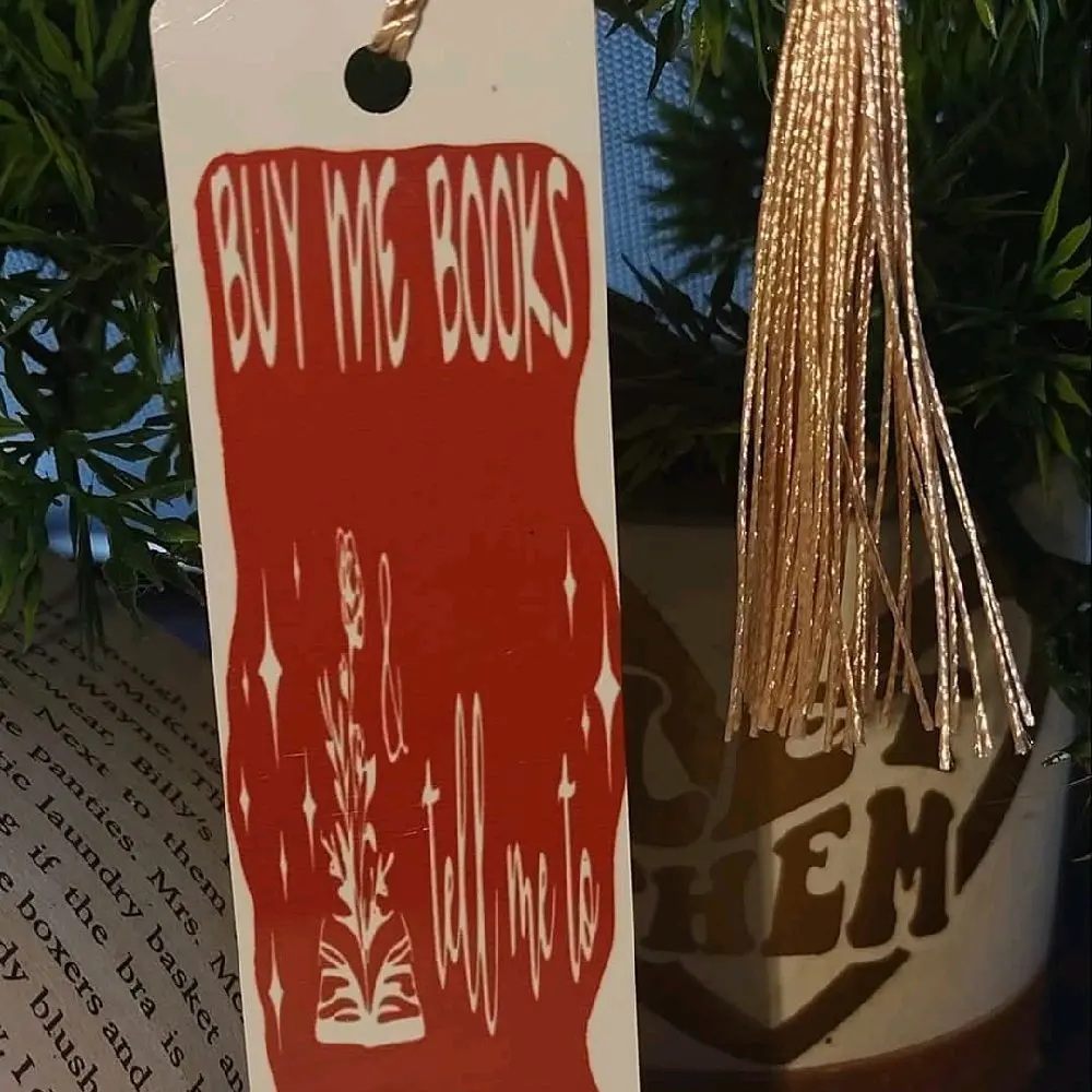 buy me books & tell me to stfuattdlagg | booktok | metal bookmark | with tan tassle