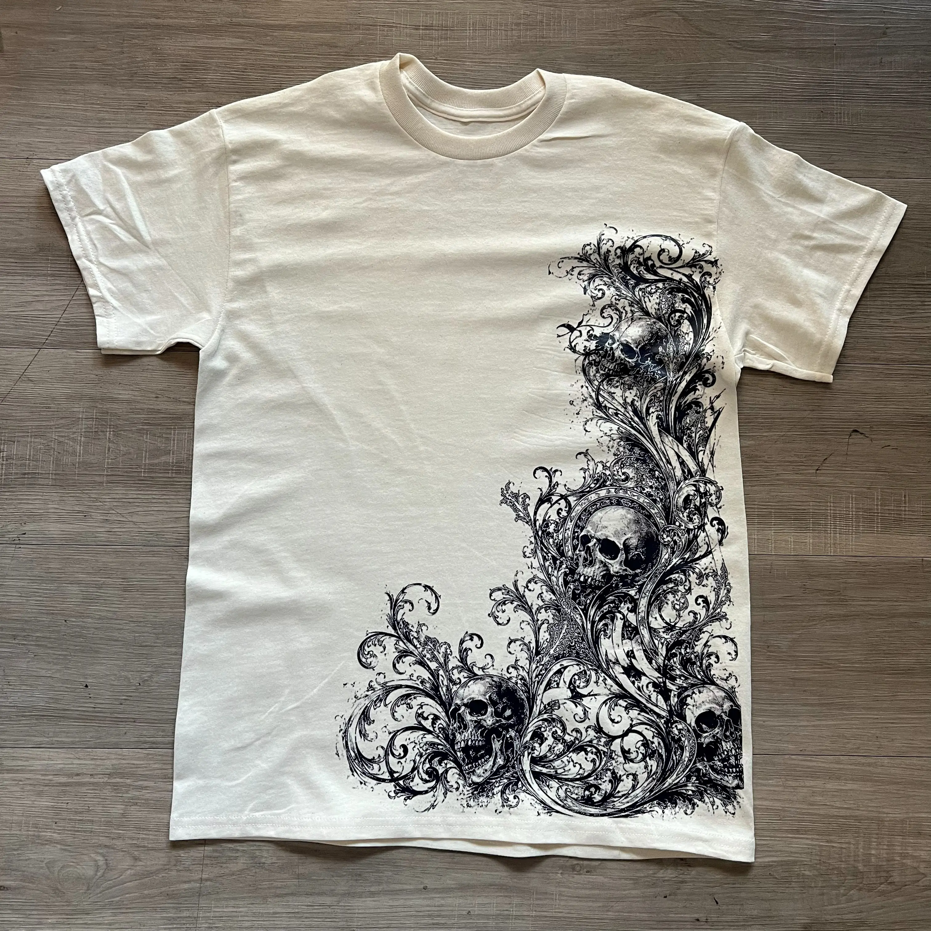 90s/2000s style skull pile graphic grunge tee