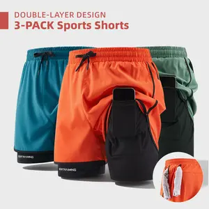 Men’s 3-pack double-layer faux two-piece running shorts with phone pocket and towel loop; quick-drying, breathable, anti-exposure design; lightweight and comfortable; versatile for running, fitness, basketball training, everyday commuting.