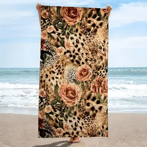A Single Pack of a Large Beach Towel Featuring Floral And Leopard Patterns, Perfect for Summer Activities. This Quick-Drying Polyester Towel Offers from Sand And Sun