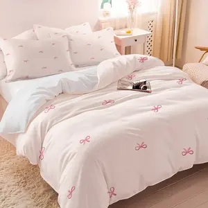 Soft blush pink mini bow print duvet cover set Includes 1 Fitted Sheet & 2 Pillowcases without Filler，Perfect for a cute bedroom décor. Simple bow print bedding set, lightweight and comfortable, suitable for all seasons.