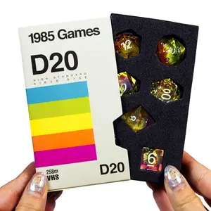 1985 Games Rainbow Bright Sharp Edge Dice Set 1-Pack | 7-Piece Resin Polyhedral RPG Dice in Retro VHS-Style Gift Box – Collectible for D&D, Pathfinder, MTG & Tabletop Role-Playing Games