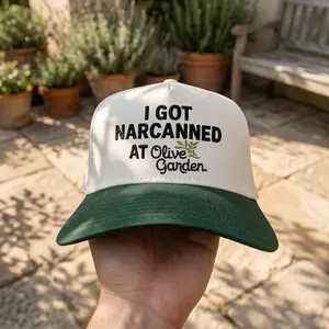 FUNNY TRUCKER HAT "I GOT NARCANNED AT OLIVE GARDEN" VIRAL MEME CAP WITH GREEN BRIM AND CREAM FRONT
