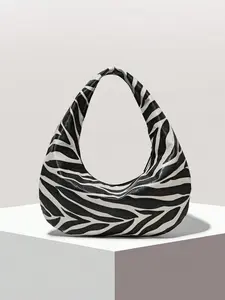 Fashion zebra   modeling one-shoulder handbag, niche design light luxury and versatile casual  bag,personality   retro fashion simple   shoulder bag, suitable for daily commuting, shopping and dating.