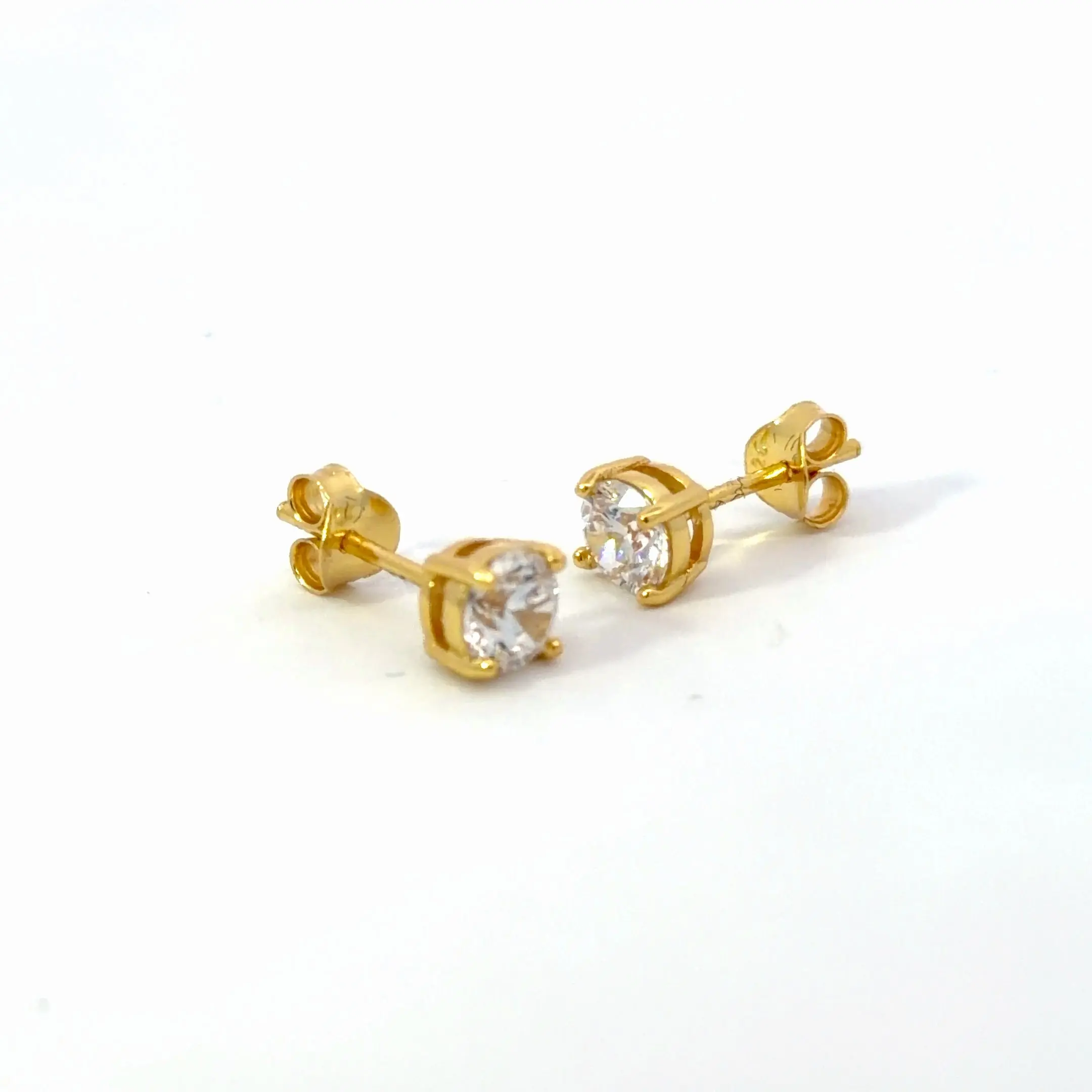 Starlette Brilliant Round Cut Stud Earrings in Gold | Plated in Gold | Simulated Diamond