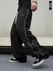 Men’s casual straight-leg pants featuring side stripe letter print and an elastic waistband; suitable for sports and leisure, street fashion style, ideal for dancing and everyday commuting—an essential piece for summer travel outfits.