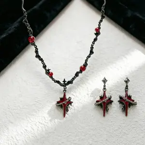 The Dark Series gun-black four-pointed star earrings, originating from Europe and the United States, are specifically designed for women and crafted from 925 silver. They exude a high-end quality and possess a unique style, making them exquisite and
