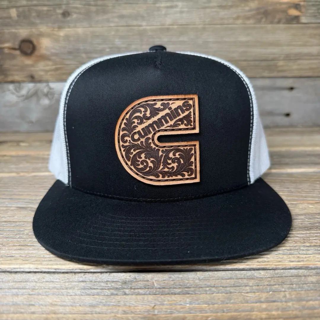 CUMMINS YUPOONG FLAT BILL LEATHER PATCH TRUCKER HAT