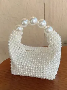 Simple   white pearl hand-woven handbag, the large pearl handle design is exquisite and elegant, the banquet party personalized shape is fashionable and versatile, Stylish Handbag, suitable for daily travel, shopping, dating, etc. Elegant Bags