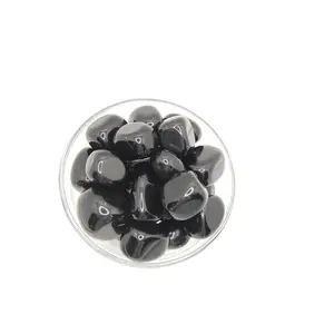 Tumbled black obsidian Tumbled black obsidian