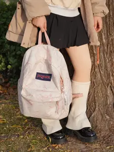 JanSport SuperBreak Plus Sport Backpack with Built-in Water Bottle Pocket - A large-capacity, durable everyday backpack suitable for work and travel.