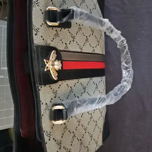 American Bee Grey and Black Handbag with Gold Bee Charm and Red Stripe Accents