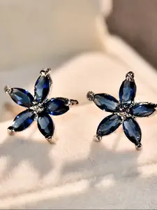 Simple and charming sapphire blue marquise synthetic zirconia silver flower stud earrings for women. Sparkling and versatile jewellery designed especially for women. Fashionable jewellery gift. High Quality Earrings