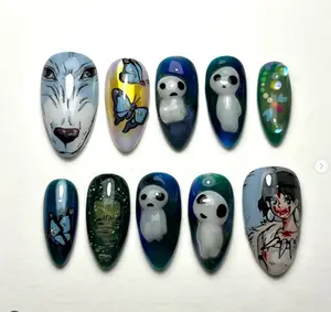 Fantasy nail art inspired by Princess Mononoke featuring wolves, Kodama spirits, butterflies, mystical forests, and San’s fierce warrior design