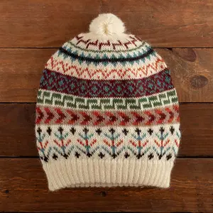 NOVICA Artisan Handmade 100% alpaca hat Traditional Knit Ivory Alpaca Hat from the Andes Alpaca Wool Ivory Multicolor Knit Patterned Peru ometric [15in Inner Circ x 7.5in W x 9in H] Andean Nature