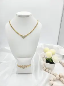 14k gold plated set with heart charm.  (35)