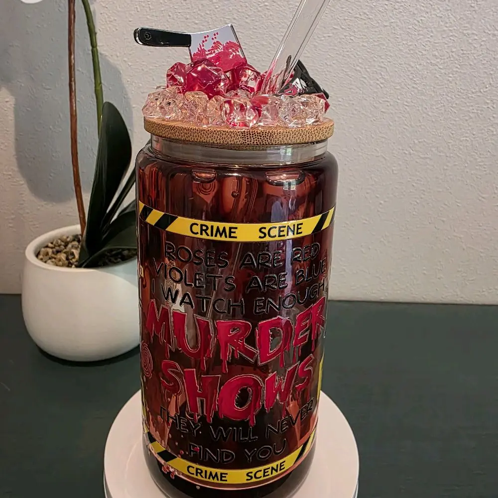 True crime lovers dream tumbler. Made from glass featuring a really cool blood dripping effect and comes with a crime scene decorated lid.