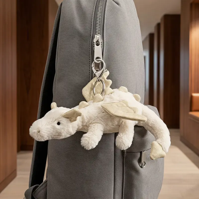 A collection of cute plush dragon keychains—accessories that add a captivating and eye-catching touch to your backpack or car keys.