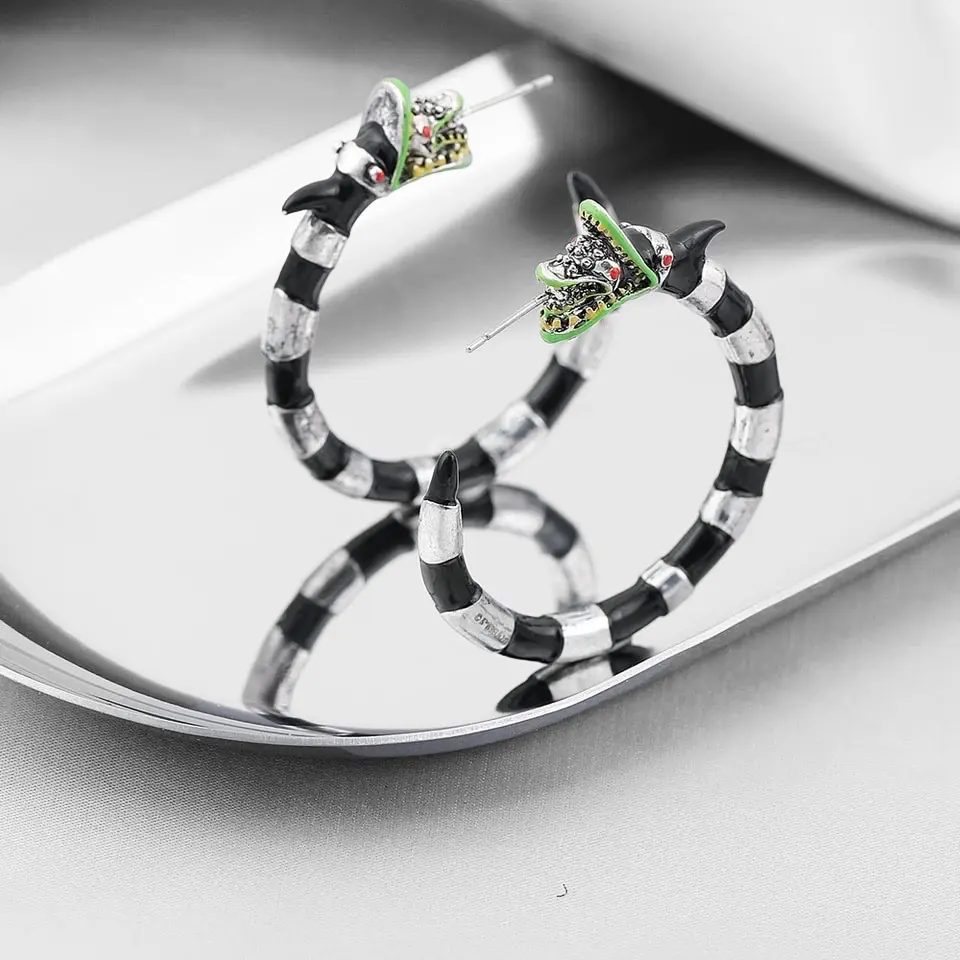 Beetlejuice sand snake black and silver hoop earrings