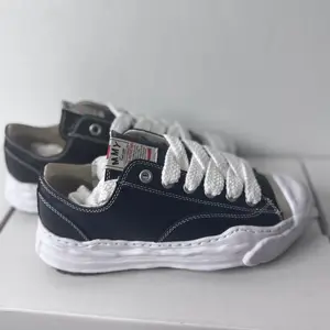 Maison MIHARA YASUHIRO low-top lace-up sneakers