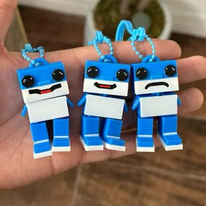 Los Tralaleritos Keychain - Blue Robot Design with Expressive Faces and Blue Beaded Chain for Easy Attachment