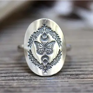 Vintage bohemian signet ring, carved with exquisite butterfly relief patterns, vintage distressed style, surrounding branch and leaf carvings, natural element style, unique and exaggerated ring, oval ring face to  the hand shape, a gift for her.