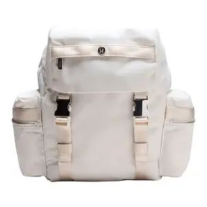 Lululemon Wunderlust 14L Mini Backpack with Drawstring and Buckle Closure for Unisex Couple Style in Bone Silver