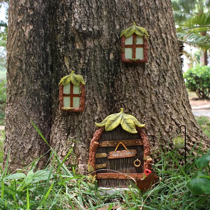 Miniature fairy doors and fairy gardens for trees, decorative garden sculptures, Garden Statue and lawn decorations that can glow in the dark, and miniature outdoor art decorations with lanterns.