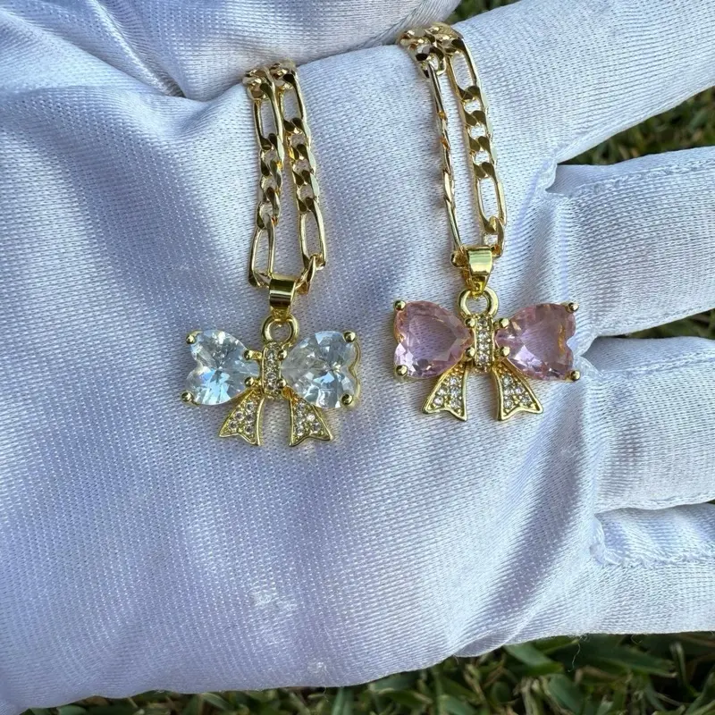 Bow Necklace with Chain - Gold-Tone Design Featuring Bow Charms and Chain Details