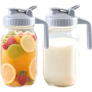 Mason Jar Pitcher With Pour Lid 32 Oz Glass Breast milk Storage Jug 1 Quart Wide Mouth Glass  Pitcher With Handle Creamer Container For Fridge Juice, Cold Brew Coffee,Lemonade,Beverage 2 Set