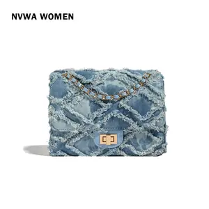 The Y2K Denim Flap - Trendy Distressed Jean Shoulder Bag Frayed Quilted Pattern with Woven Chain for Casual Streetwear design plain all-match commuter bag crossbody