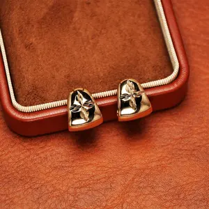 Golden engraved patterned earrings