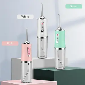 Travel-Size Water Flosser (Oral Irrigator) with Nozzles, Adjustable Cleansing Settings, Daily Oral Care Tool to Prevent Cavities
