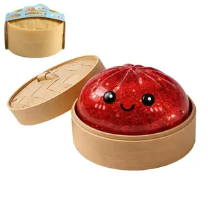Brand new shiny dumpling toy, packed in a box, can be squeezed, has sensory stimulation function, used for stress relief