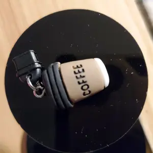 Amora's "Coffee Cup" Dust Plug for Cellphones Tablets &More. Compatible with Type-C and iPhone Plugs Easy to Use and Clean