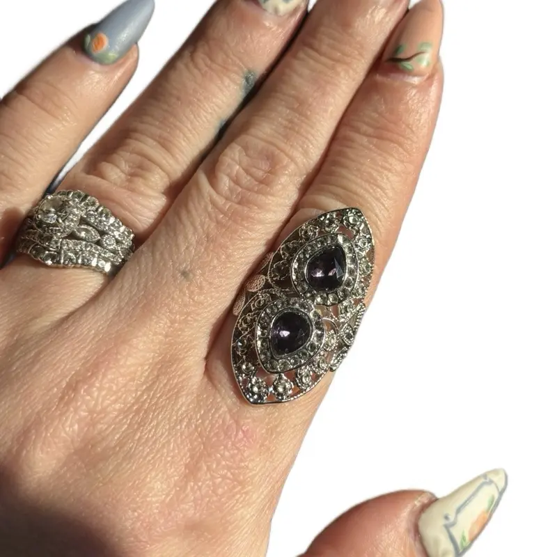 Vintage Style Double Amethyst Ring Pull with Intricate Filigree Design and Sparkling Gemstone Accents