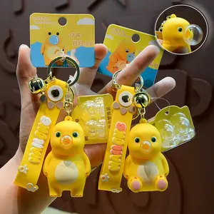 Cute Yellow Dinosaur Squishy Keychain, Squeeze Blow Bubble Stress Relief Toy Key Ring, with Bell Wrist Strap Backpack Pendant Gift for Kids Girls