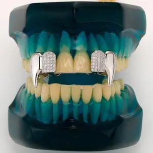 A Complete Set of Golden Teeth Adorned with Zirconia, Designed for Men Who Embrace a Vampire Aesthetic. This Fashionable Teeth Set Makes for Perfect Gifts for Occasions Like Valentine'S Day, Halloween, Christmas, Or Birthdays