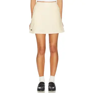 Lacoste Golf Core Mini Skirt in Powder & White