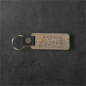 Delta Sigma Theta Sorority Wood Keychain with Engraved Logo and Durable Leather Strap for Sorority Members Enter in comments if you want a tassel