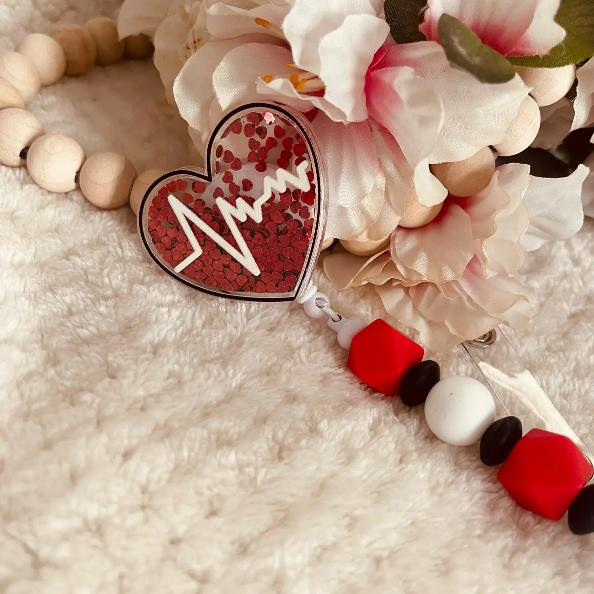 Shaker heart badge reel