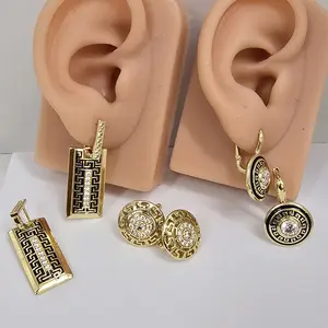 # 0057 Arracadas pequen̈a con broche frances oro laminado 14k Alta calidad