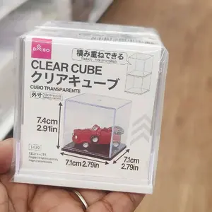 clear acrylic display cube for collectibles.
