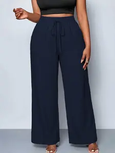 Women’s ultra-comfortable casual long pants made from Lyocell linen weave—soft drape, pockets, drawstring elastic waistband; ideal for home wear and leisure activities; a must-have piece for summer outings.