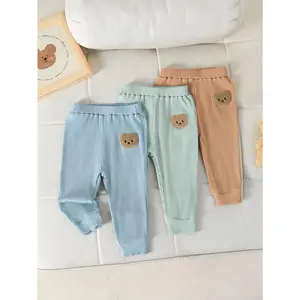 3-Pack Baby Boys Solid Ribbed Knit Bear Patch Pants - Soft Stretch Leggings for 1-18 Months Ready Stock 42511044