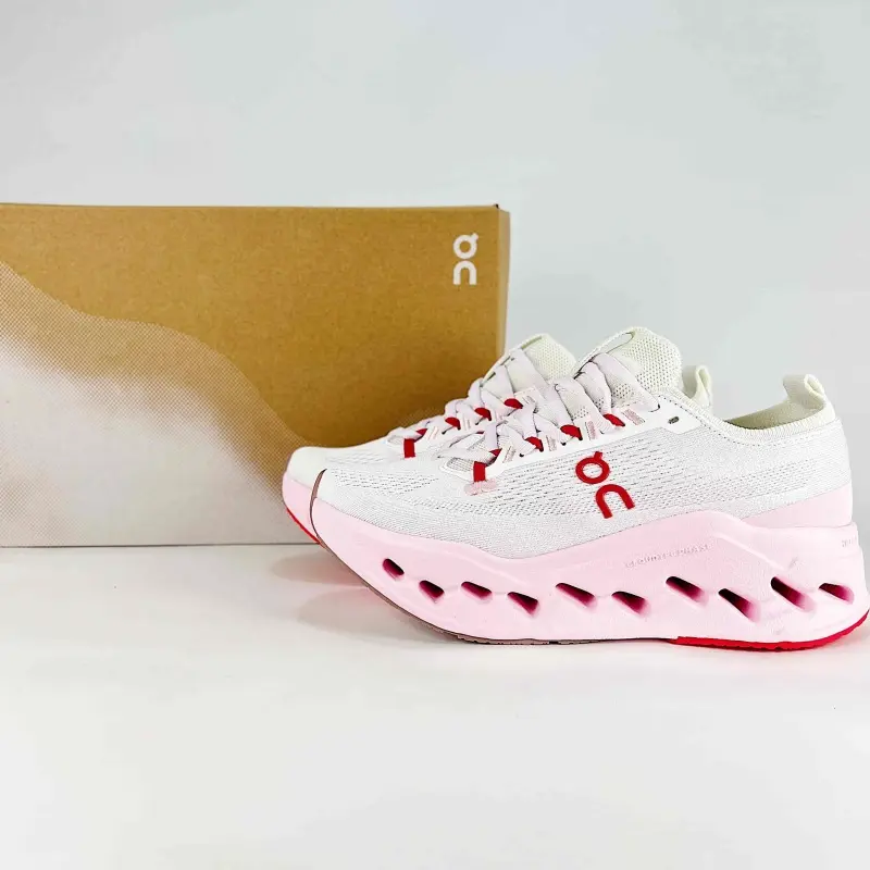 Low-top casual trainers perfect for all-day weekday office commutes & weekend light fitness jogging sessions, sweat-wicking stretch knit mesh white pink red colorblock silhouette, open mesh airflow channels