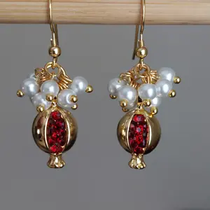 Gold plated pomegranate earrings with red zircons ang glass pearl stand choker