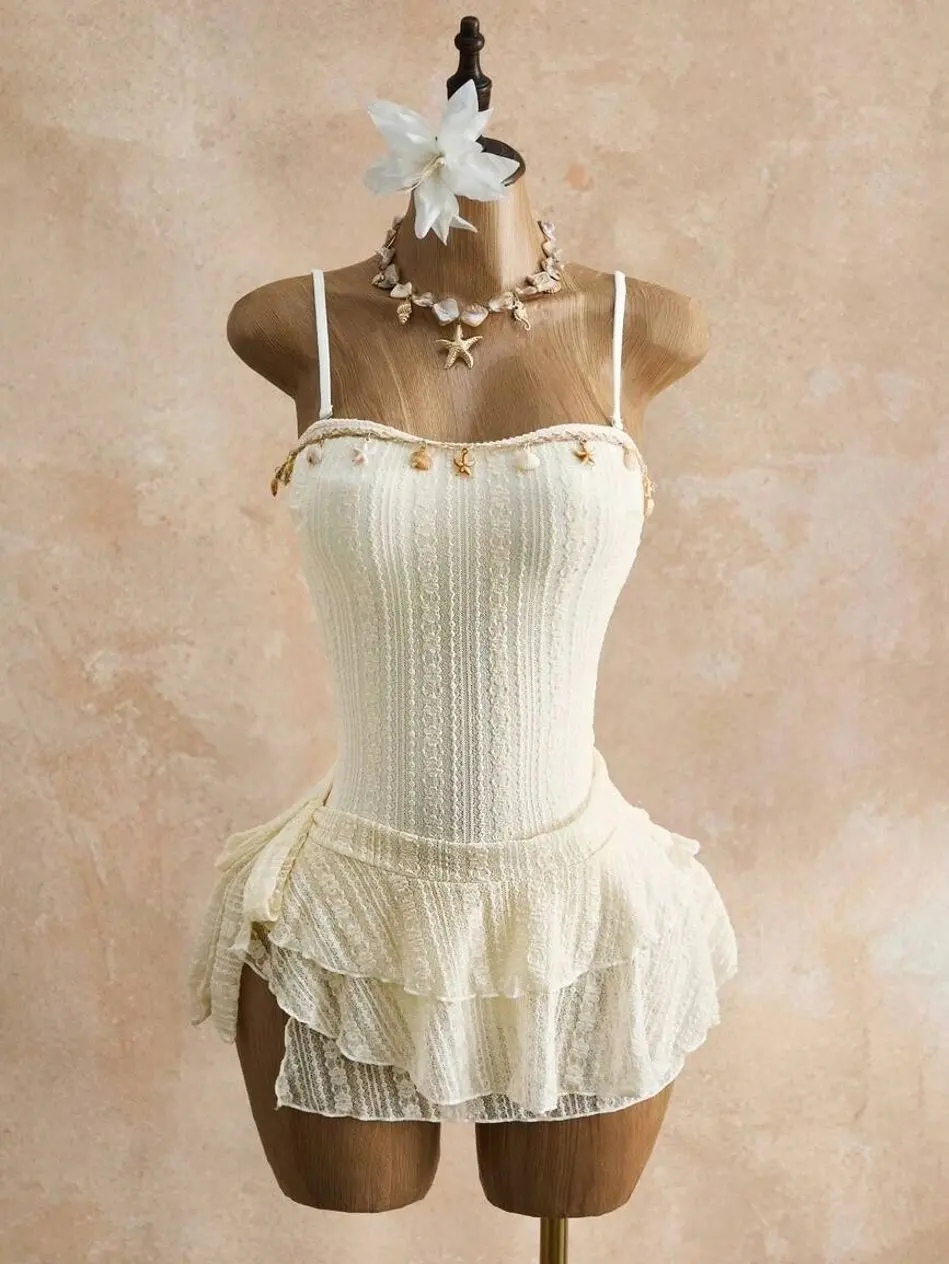 Bellisia Cream Textured Lace 2-Piece Swimsuit & Skirt Set | Seashell Trim Backless One-Piece | Tiered Ruffle Mini Skirt Mermaid Core Bridal Bathing Suit